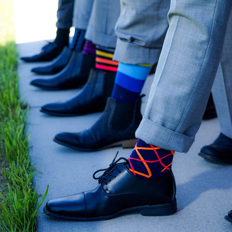 groomsmen standing with socks showing