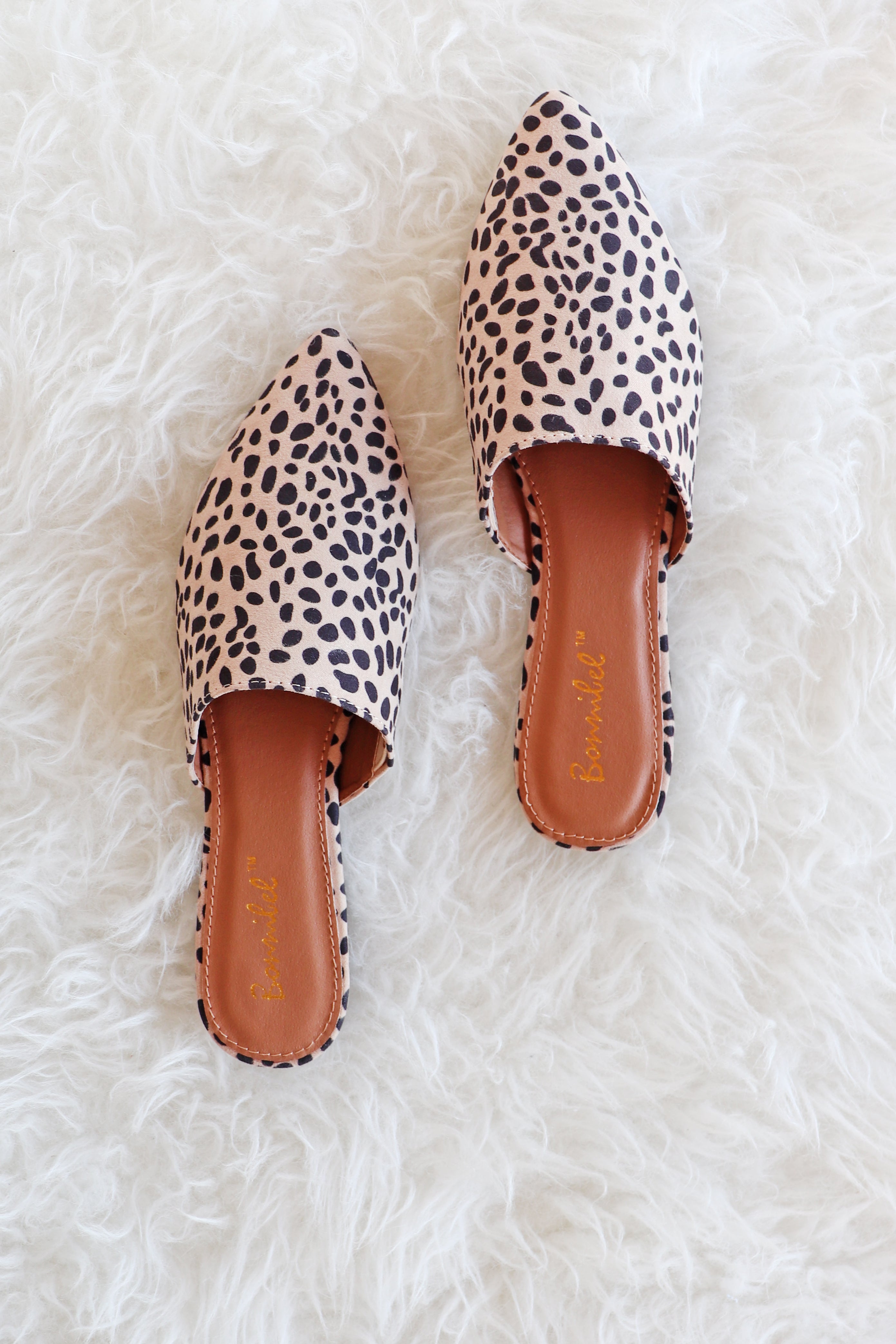 cheetah slip on mules