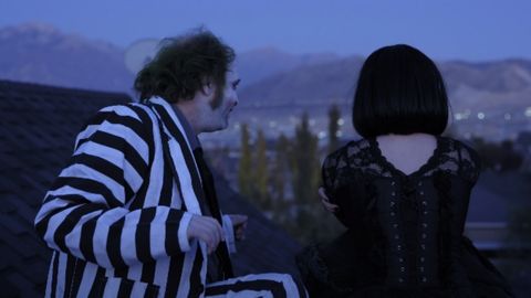 Beetlejuice cast on top of  a roof