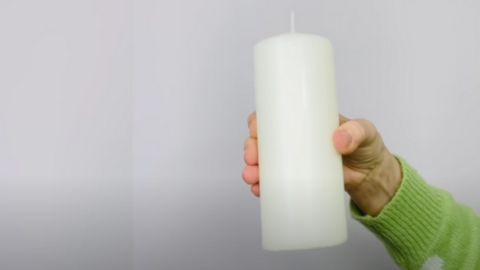 Hand Holding  Candle