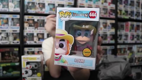 Man Holding Funko Pop