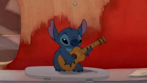 Photo of Stitch Playing Guitar