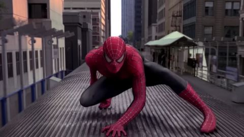 Spider Man on Top of a Moving Train