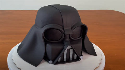 Star Wars Darth Vader full fondant cake on a wooden table