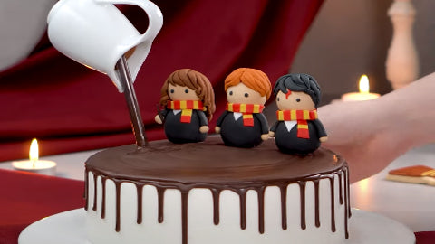 cake with Hermione, Ron and Harry Potter fondant topper