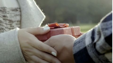 couple holding gift