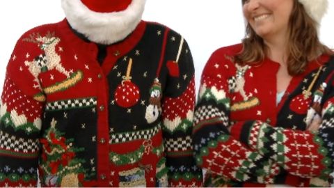 couple wearing christmas sweaters