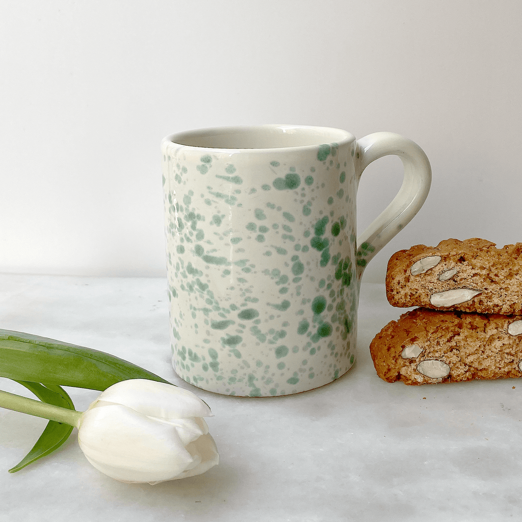 https://cdn.shopify.com/s/files/1/1141/6756/products/hot-pottery-coffee-mug-pistachio-392625_1024x1024.png?v=1695574868