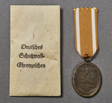 German WWII Third Reich West Wall Medal w/Carl Poellath Packet