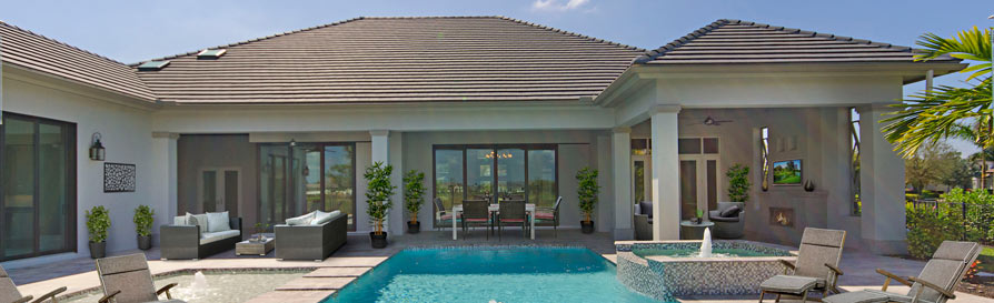 A luxury home with a large cabana by the pool