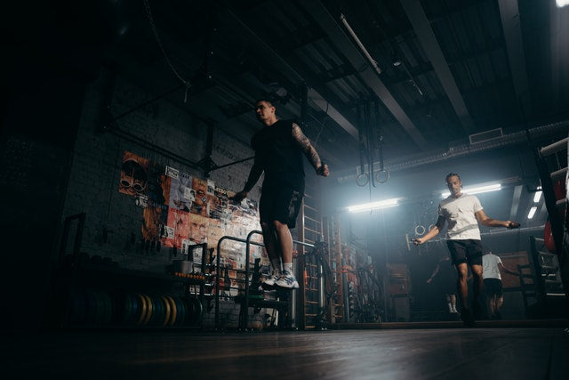 People jumping rope in the gym.