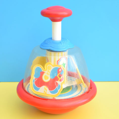 fisher price spinning top