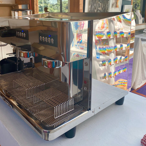 Fused coloured glass reflecting in our coffee machine