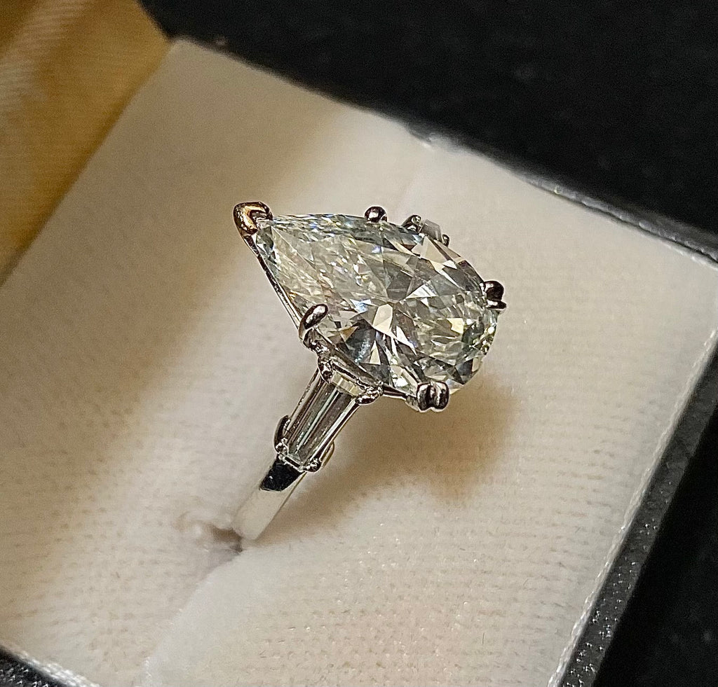 Designer's Platinum with Pear shape Diamond 3-stone Engagement Ring