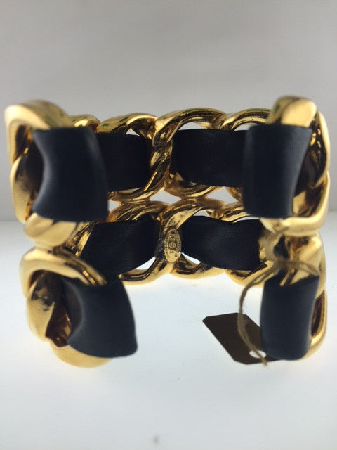 CHANEL Contemporary Gold Plated Cuff Bracelet with Black Leather - $6K