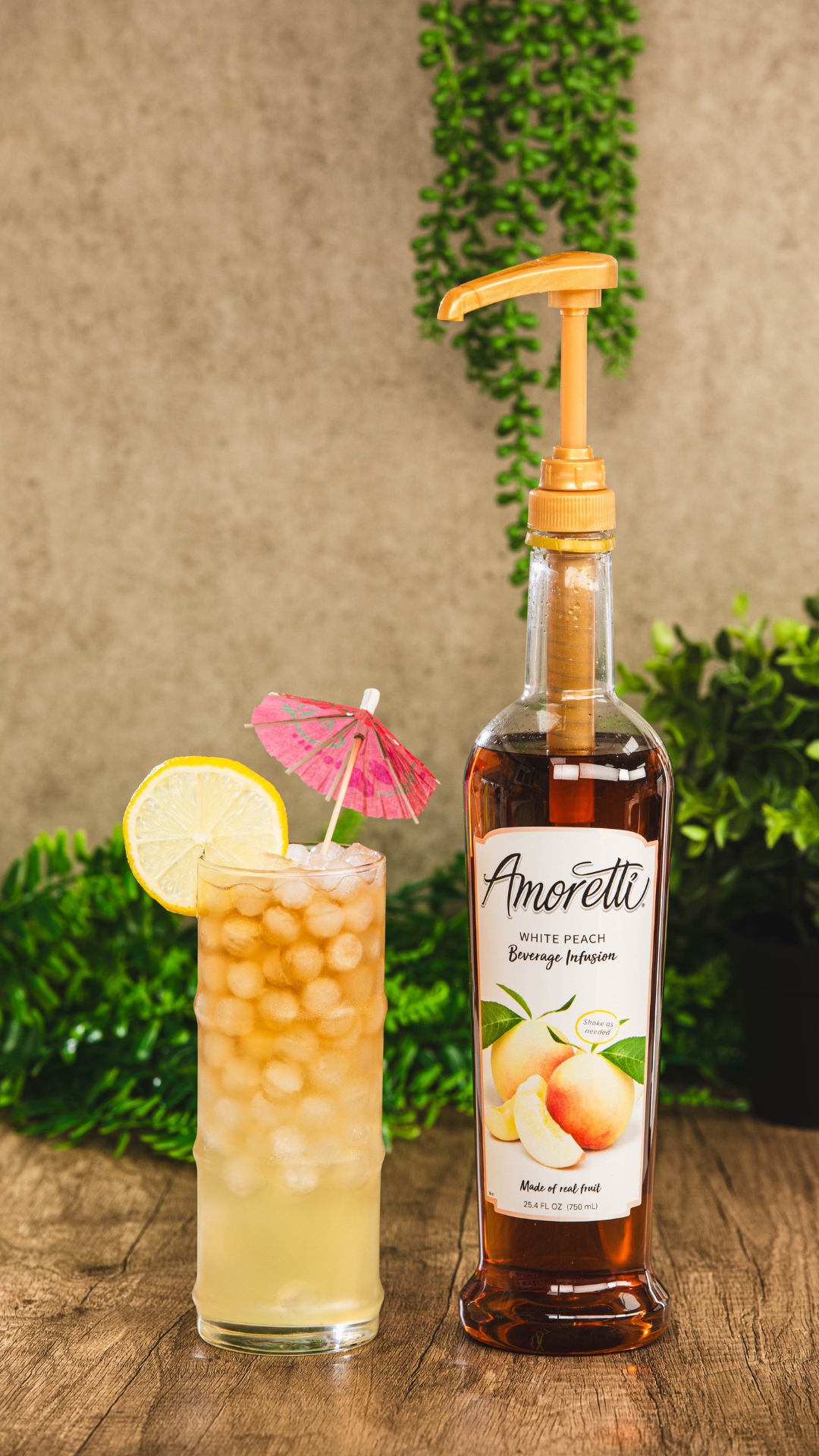 Peach Long Island Iced Tea next to Amoretti White Peach Beverage Infusion