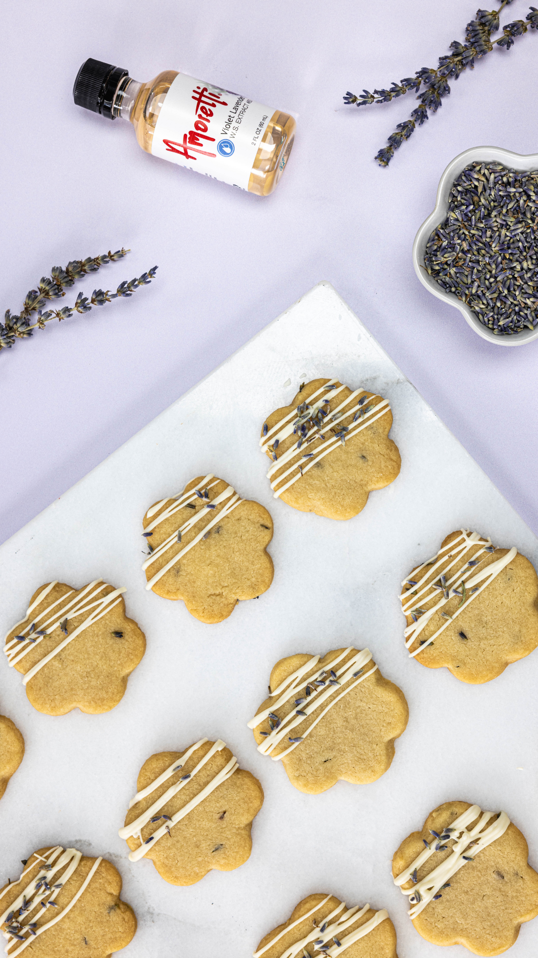 Lavender Honey Shortbread Cookies made with Amoretti Violet Lavender Extract Water Soluble surrounded by dried lavender