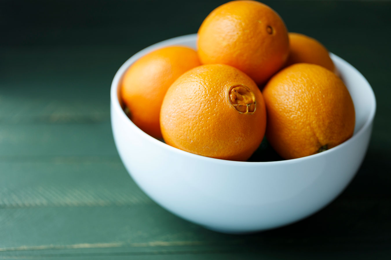 A beautiful bowl of oranges on a new photo board.