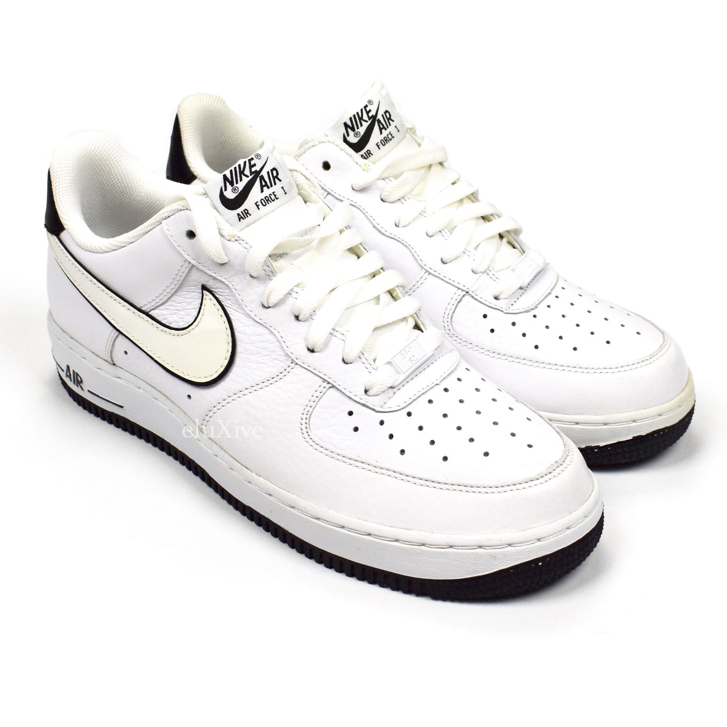 white air force ones with black trim