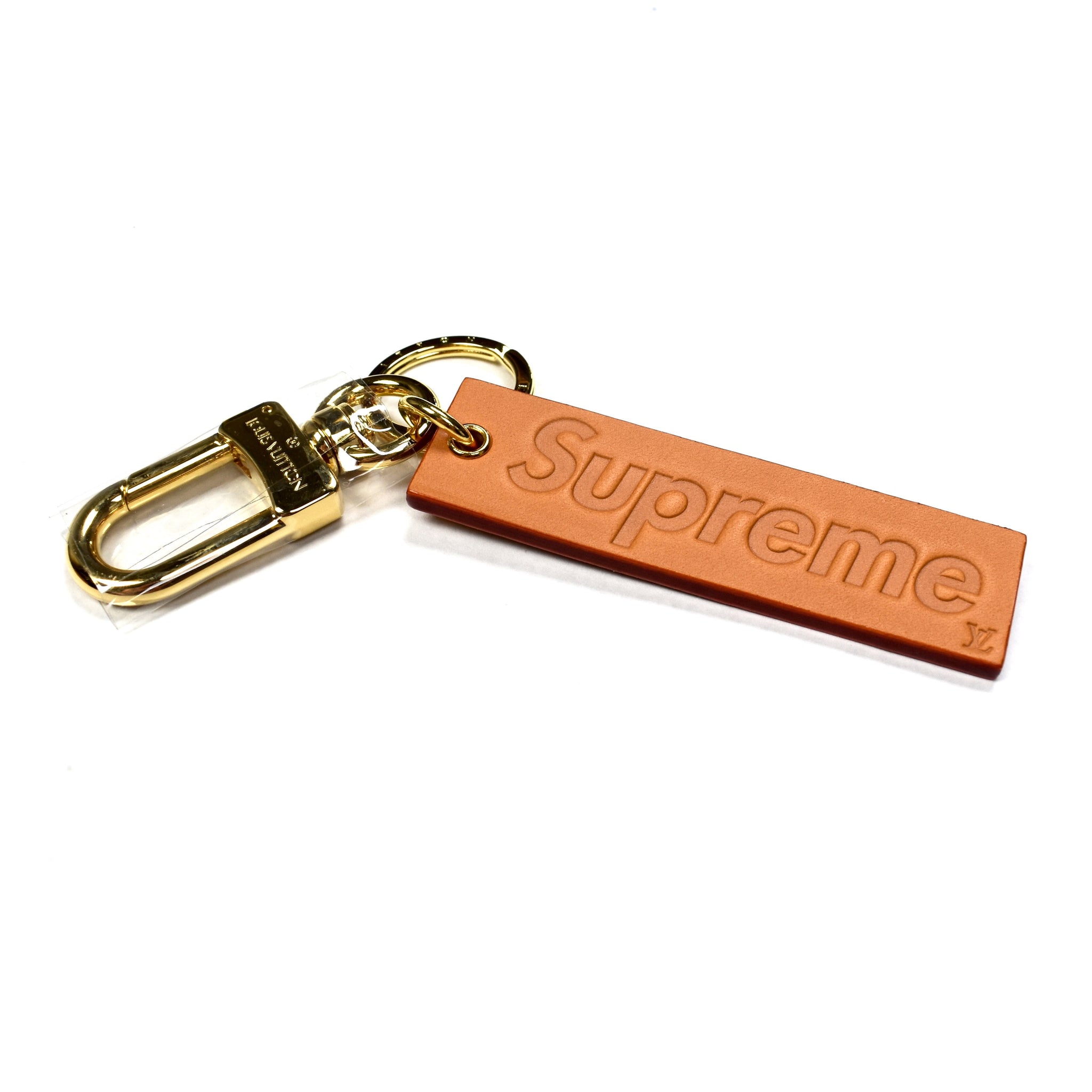 Louis Vuitton x Supreme - Tan Leather Box Logo Embossed Keychain – eluXive