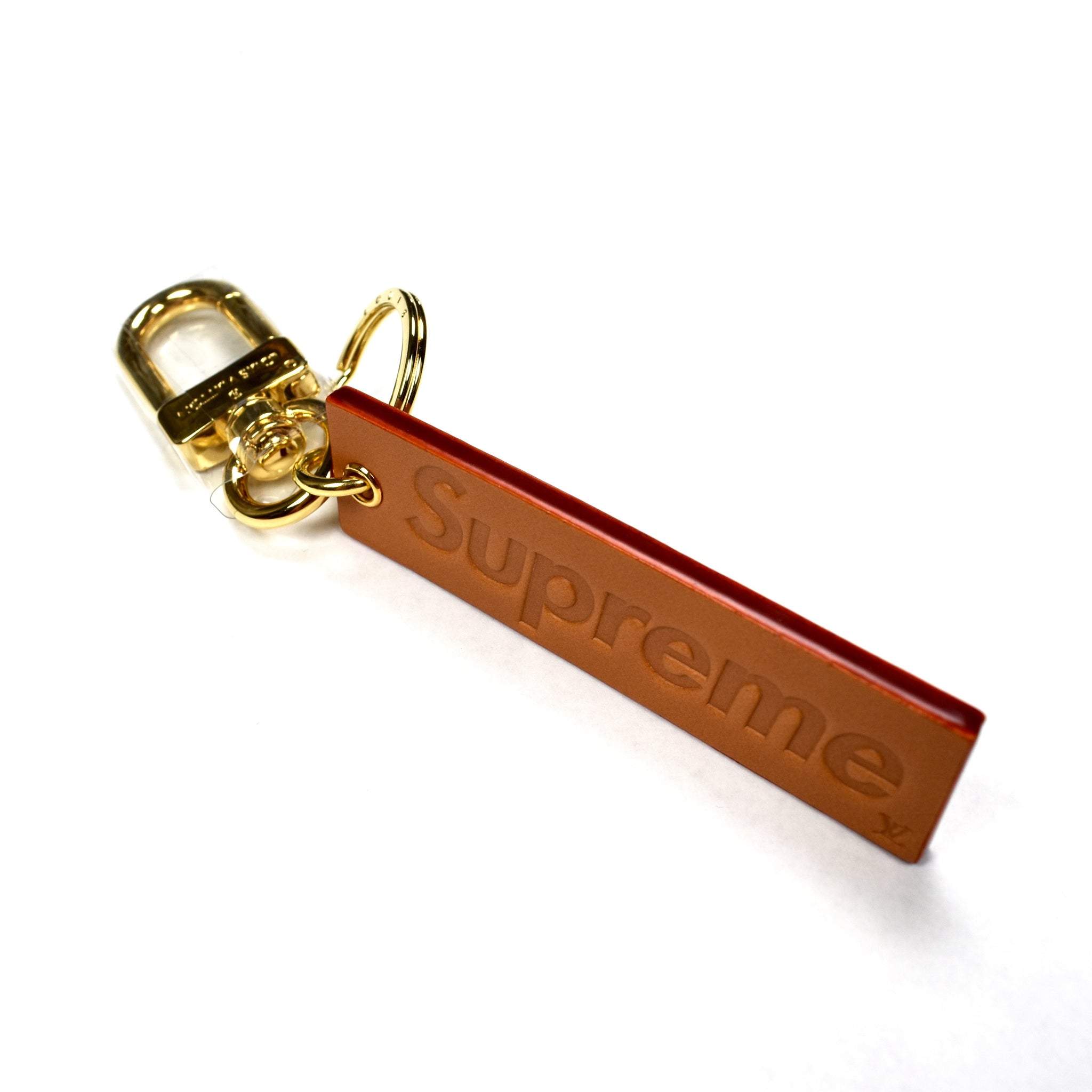 Louis Vuitton x Supreme - Tan Leather Box Logo Embossed Keychain – eluXive