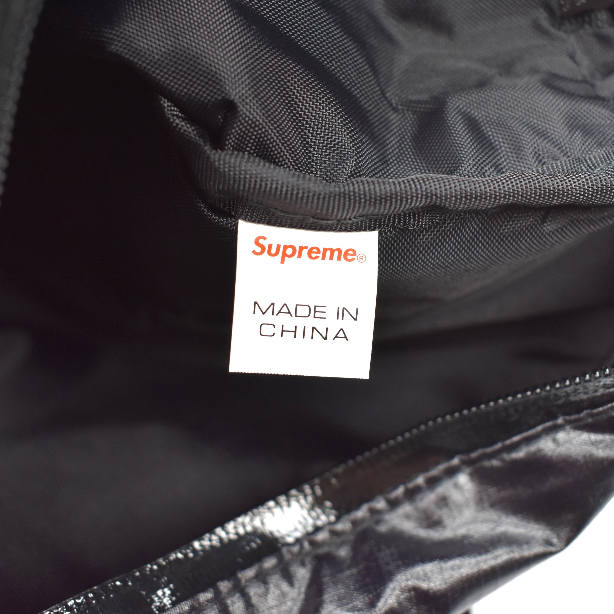 supreme bag tag