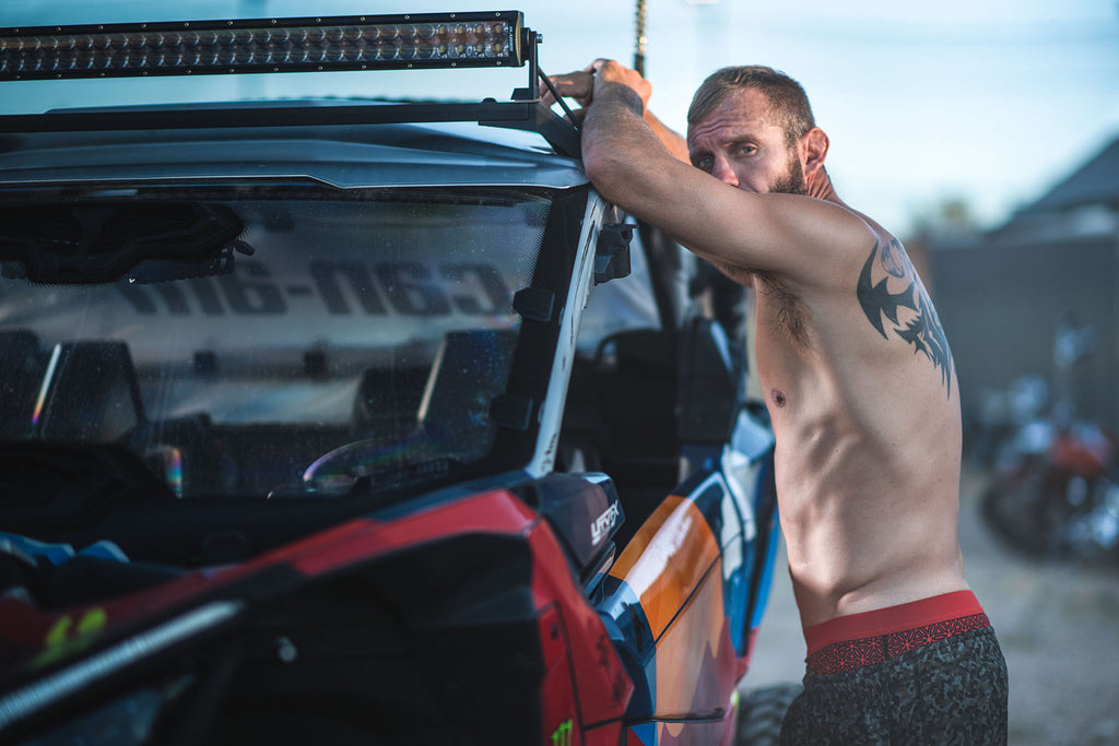 UFC fighter Cowboy Cerrone standing beside his truck while wearing SHEATH Boxer Briefs