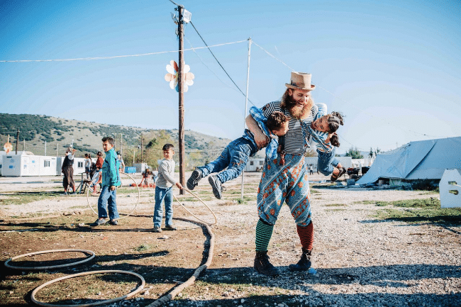 Kids clowns refugee camps