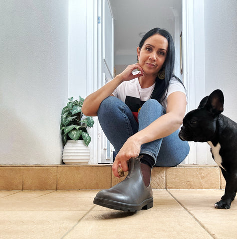 Tegan Murdock in her Blundstone boots with a french bulldog