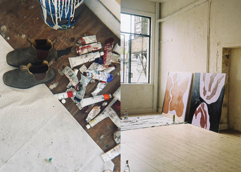 Blundstone brown boots beside tubes of paint in Jordana Henry's studio