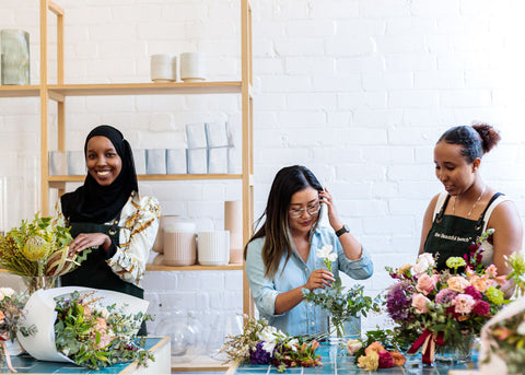 Photo of staff arranging flowers at The Beautiful Bunch studio for Lunch Lady Magazine