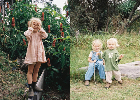 A blonde girl wearing Blundstone boots and a dress, and two other blonde children