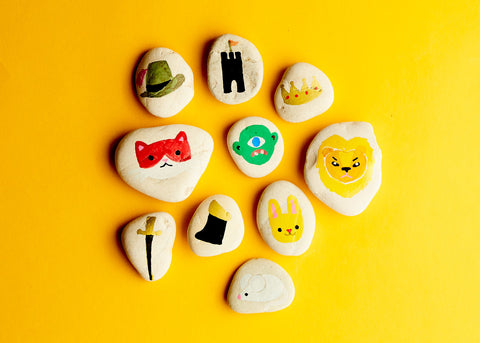 A photo of handmade story stones with fair tale images on them by Beci Orpin for Lunch Lady