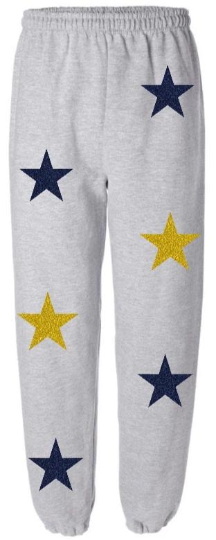 yellow sweatpants with white stars