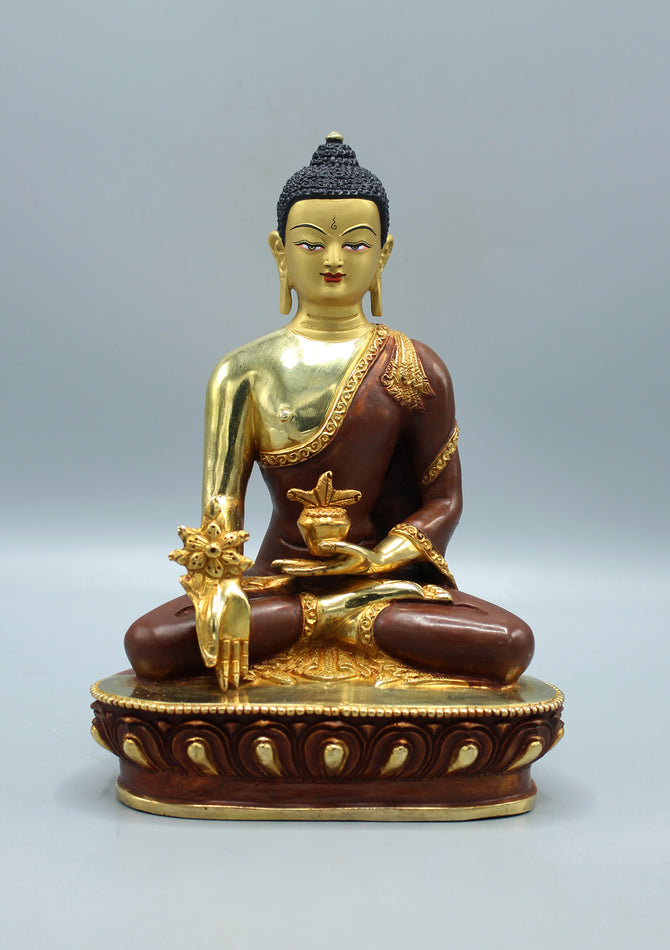 Meditating buddha statue in varada mudra known as Medicine Buddha