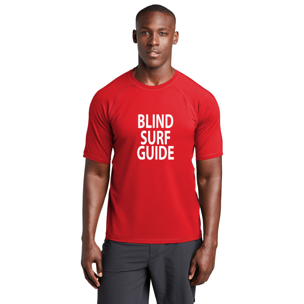 Red short sleeve rash guard tee - front reads BLIND SURF GUIDE in white
