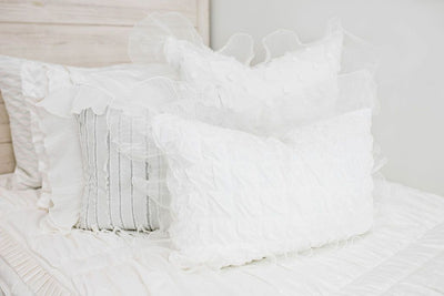 white ruffle polka dot euro, ruffle gray/blue textured pillows, white ruffle textured lumbar
