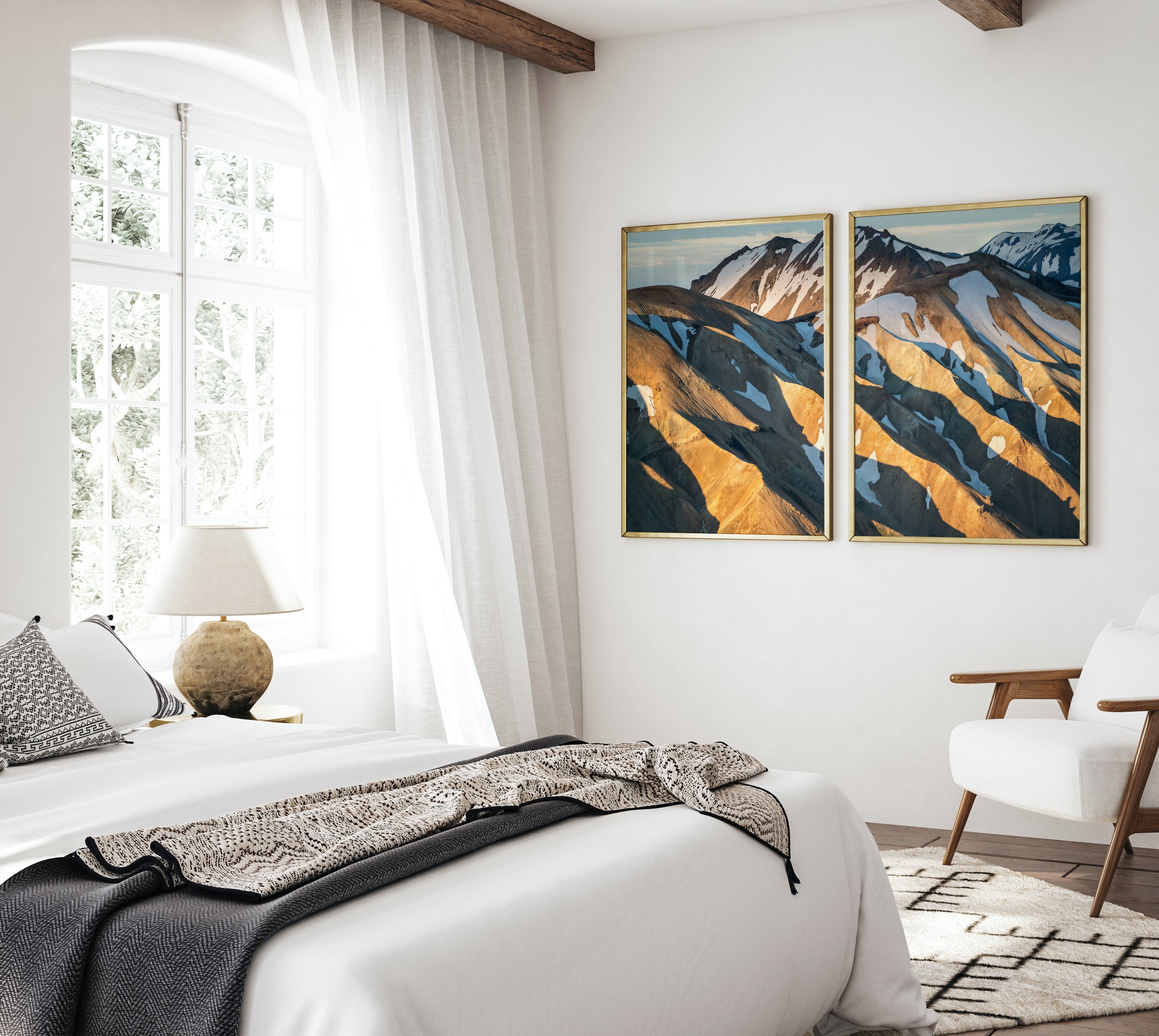 two mountain pictures in bedroom