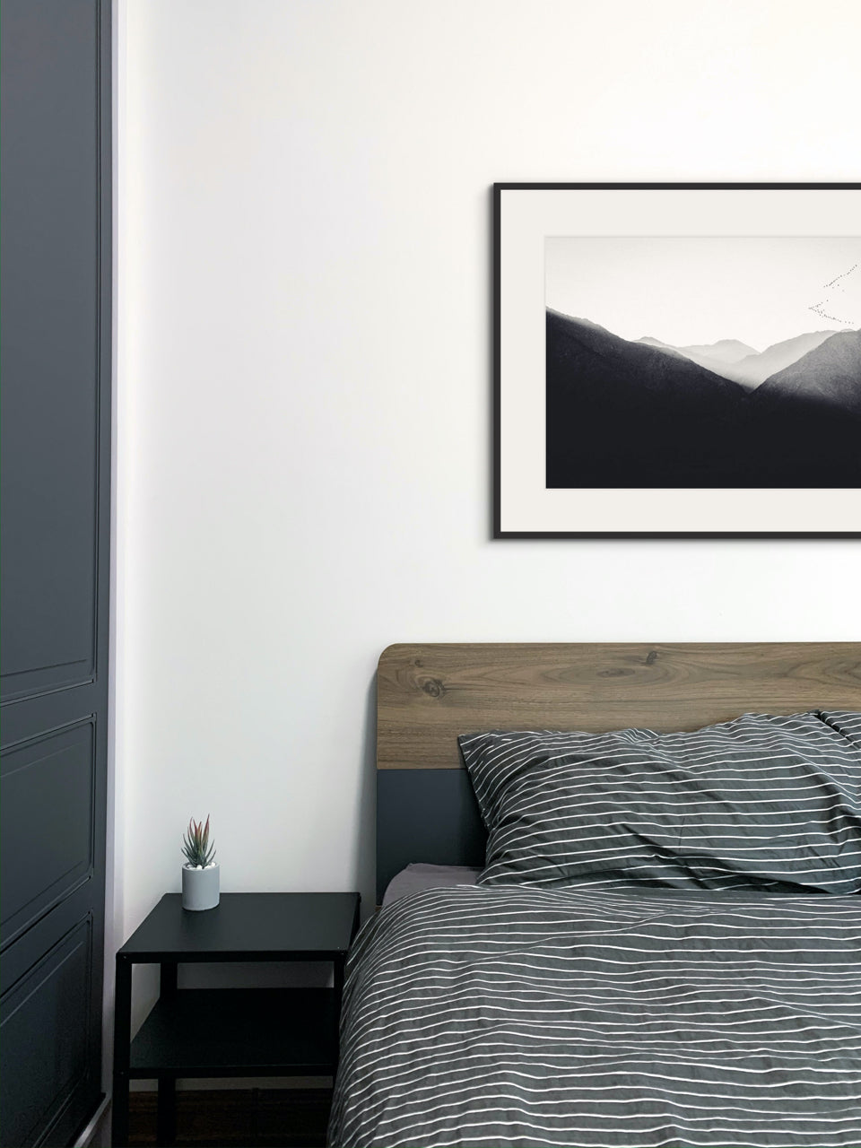 black and white art in bedroom