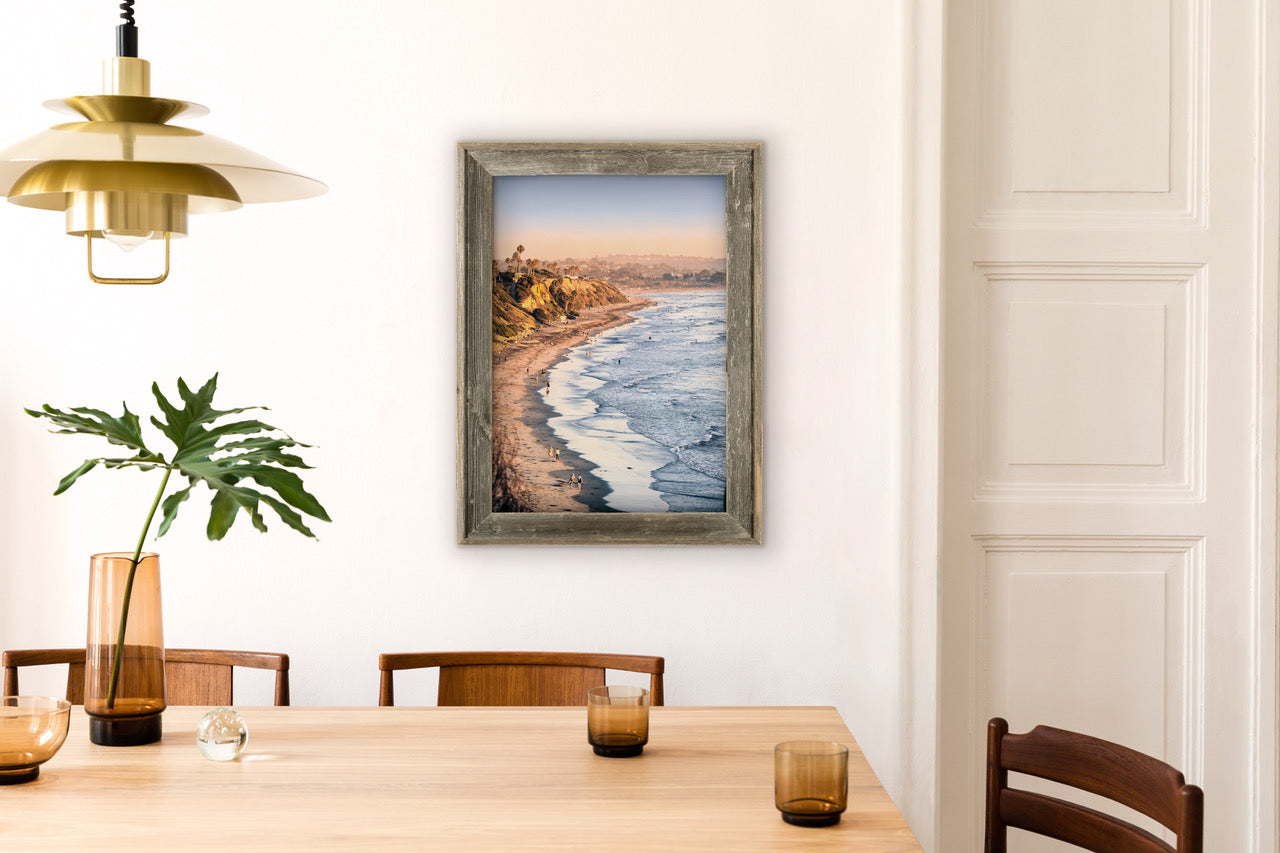 Framed beach photograph in kitchen