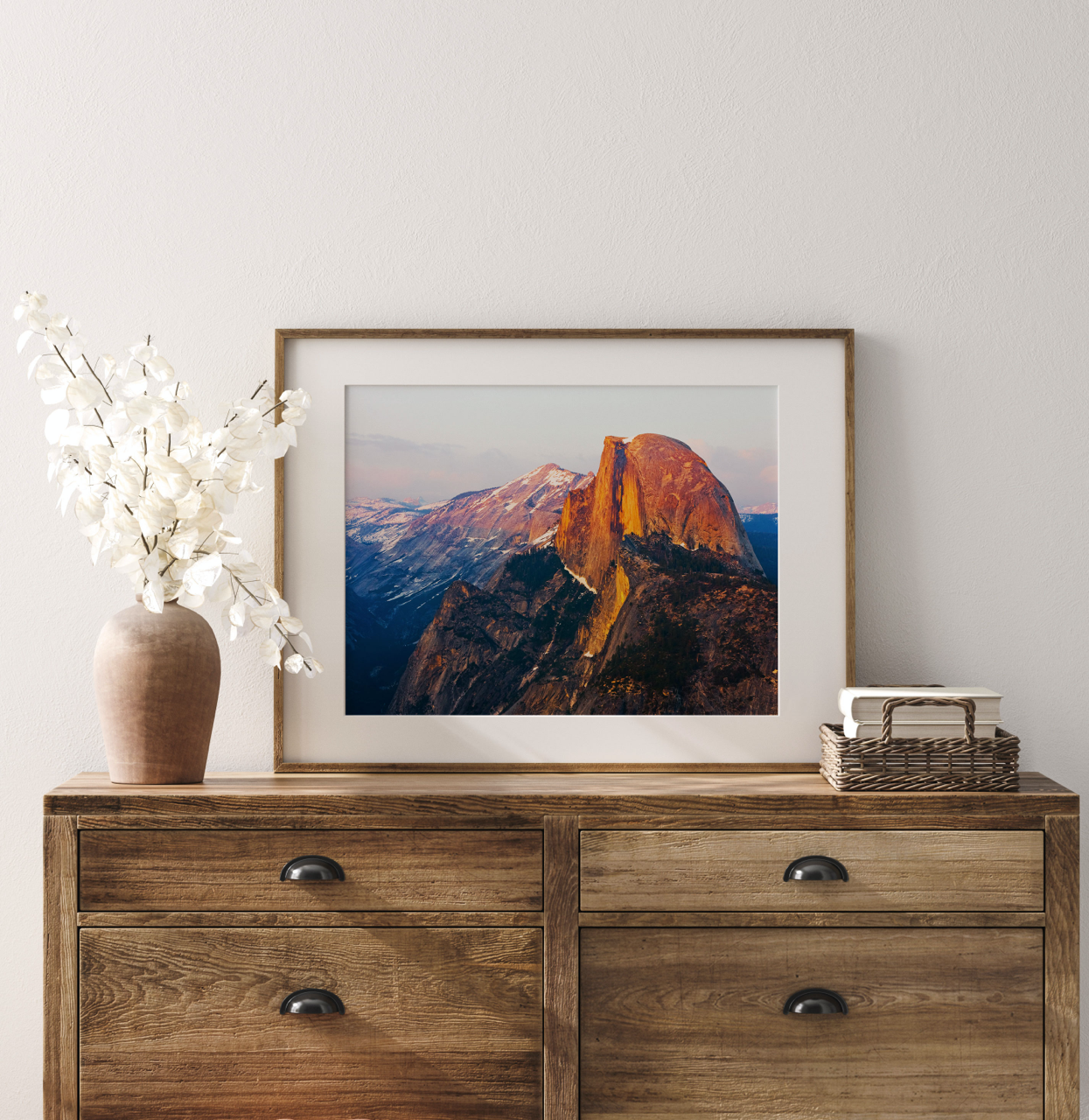 framed Yosemite photograph on dresser