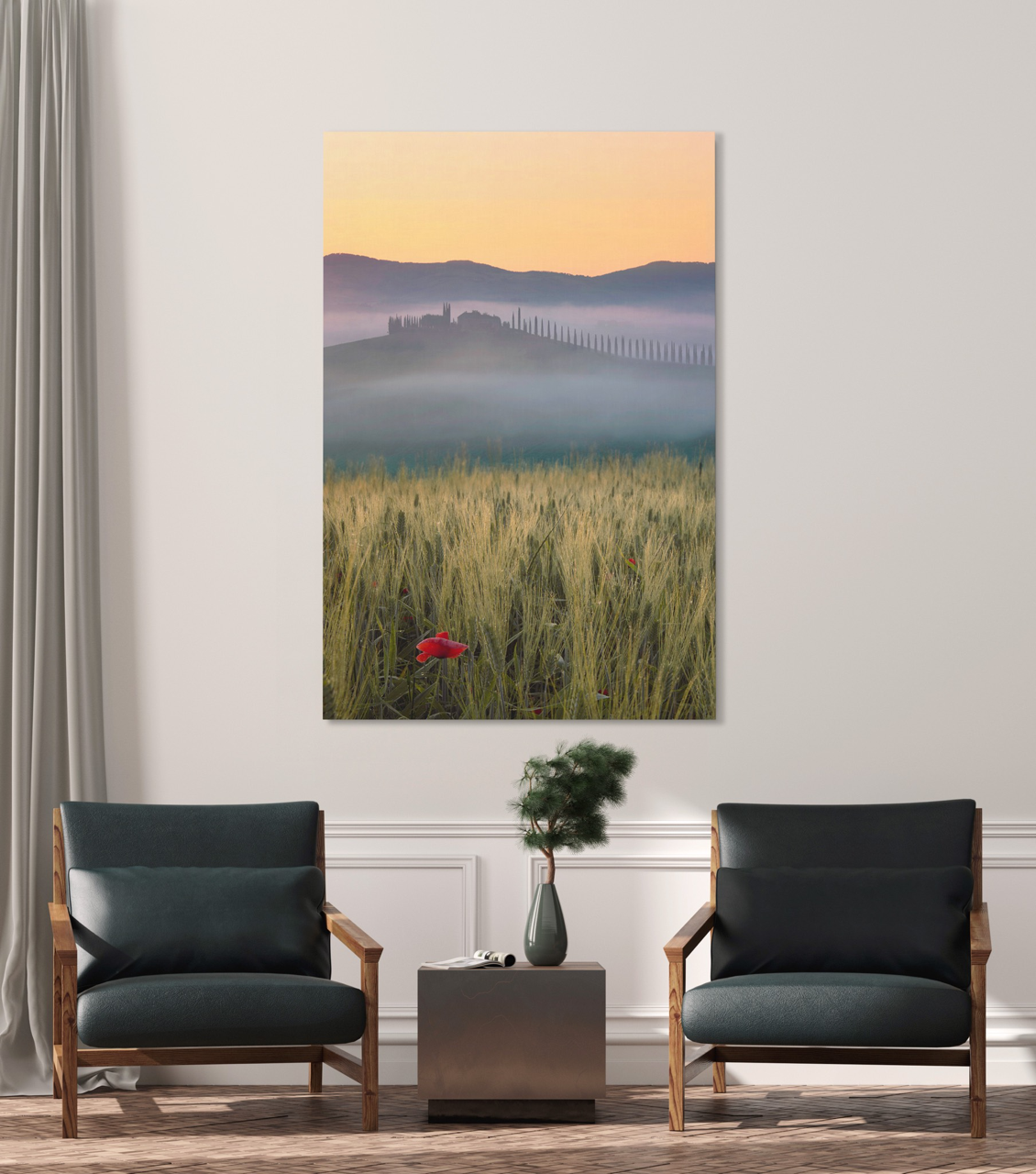 mid century modern chairs with a large sunset photography print