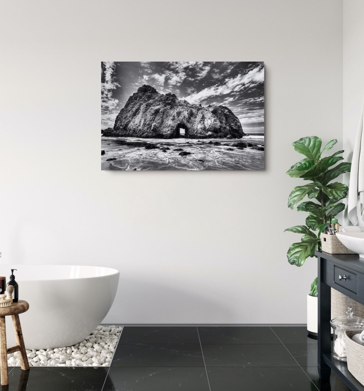 black and white coastal art in bathroom