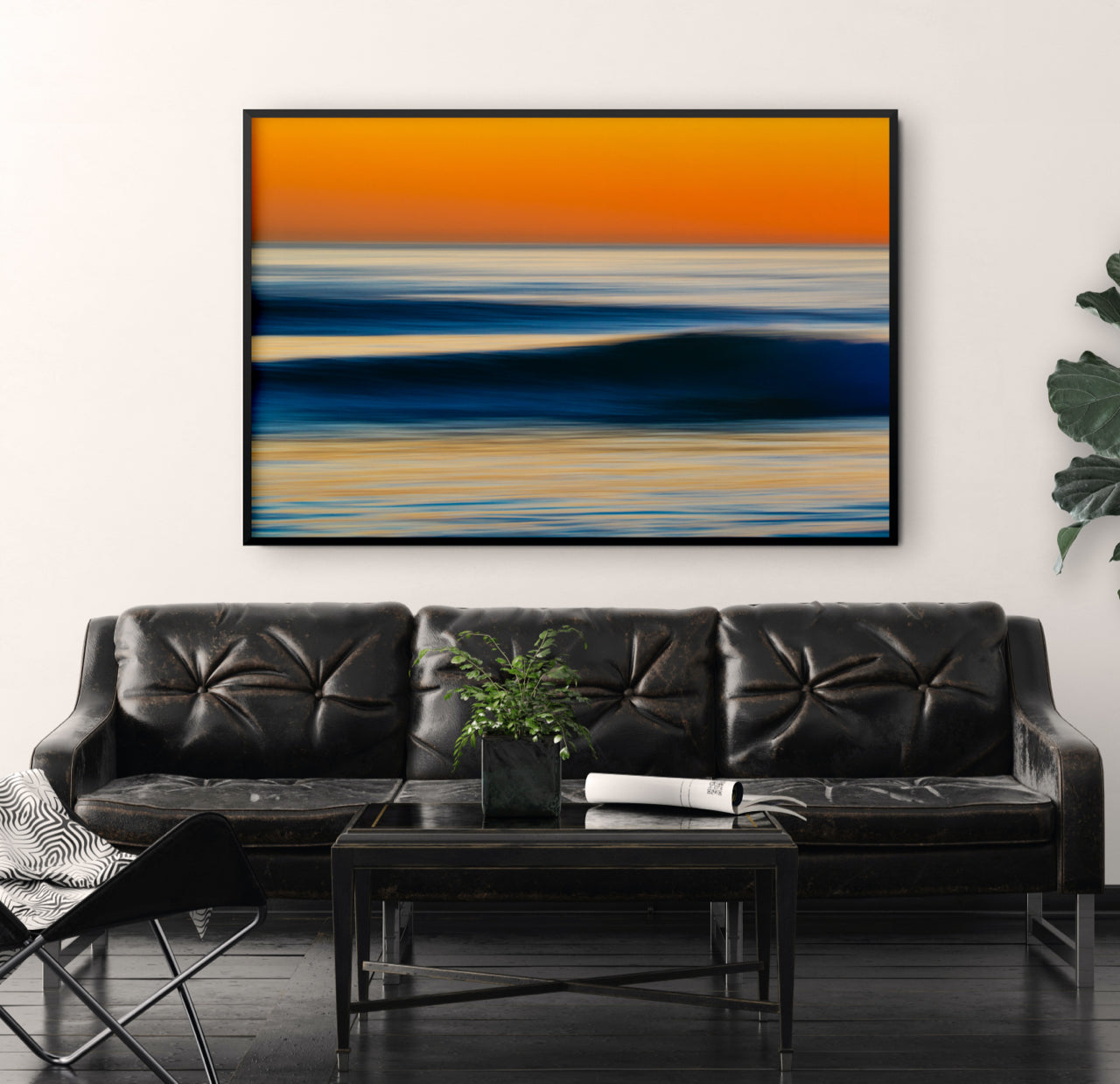 large abstract living room wall art over black couch