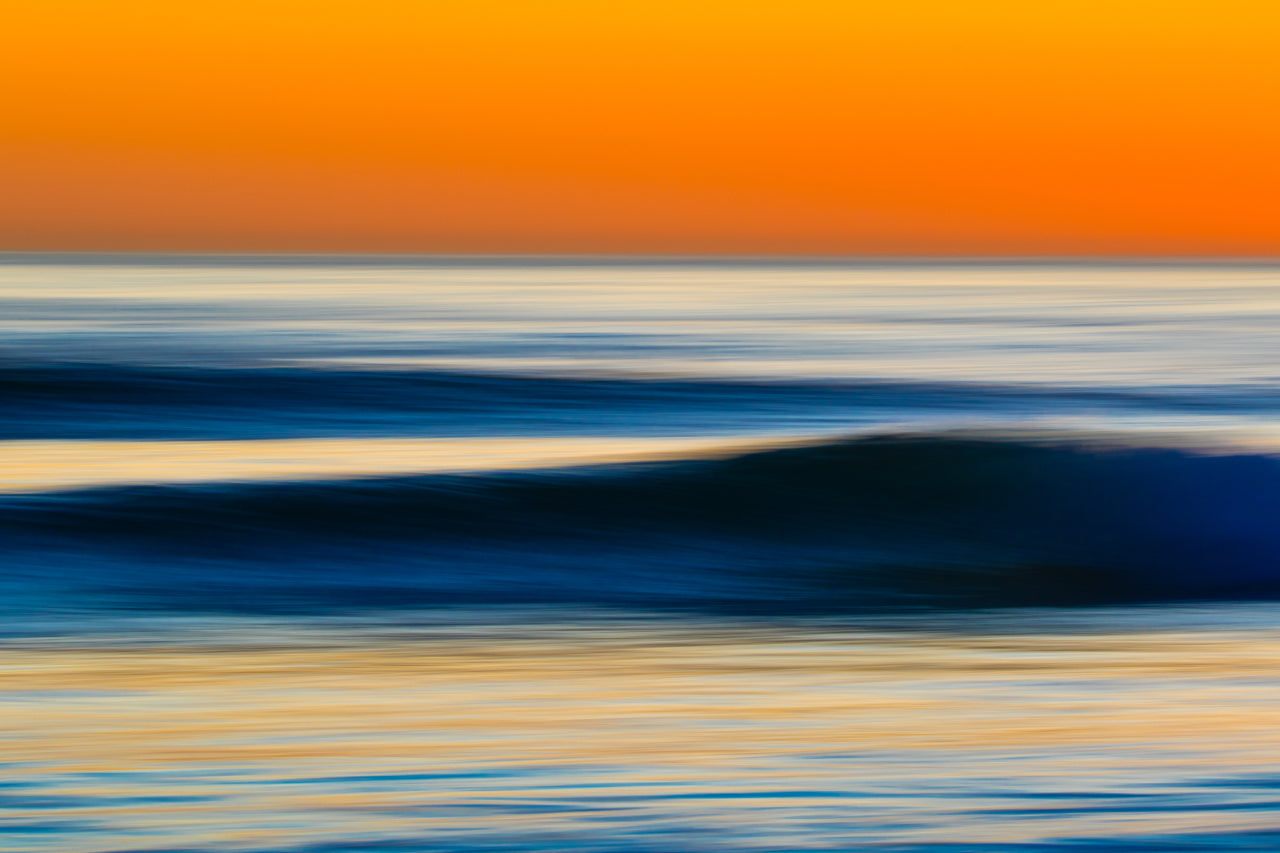 orange and blue ocean art