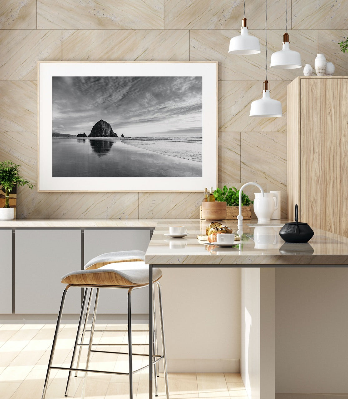 modern coastal kitchen with black and white beach photograph