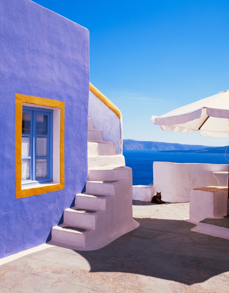 Purple wall with stairs in Greece