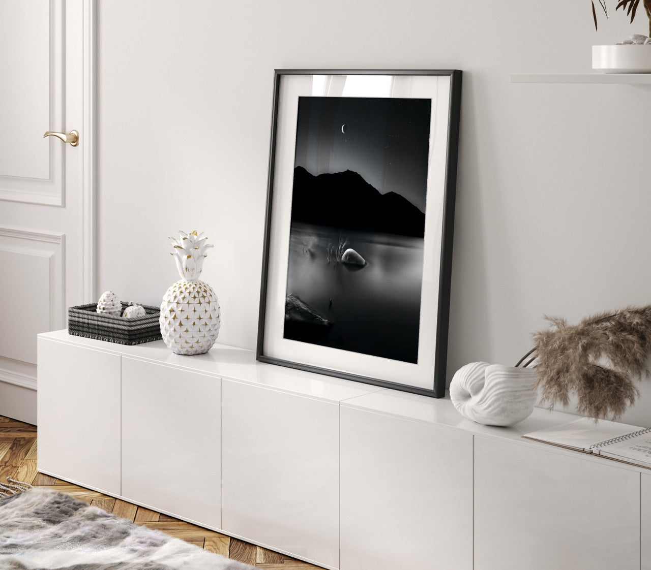 Framed black and white photograph in living room