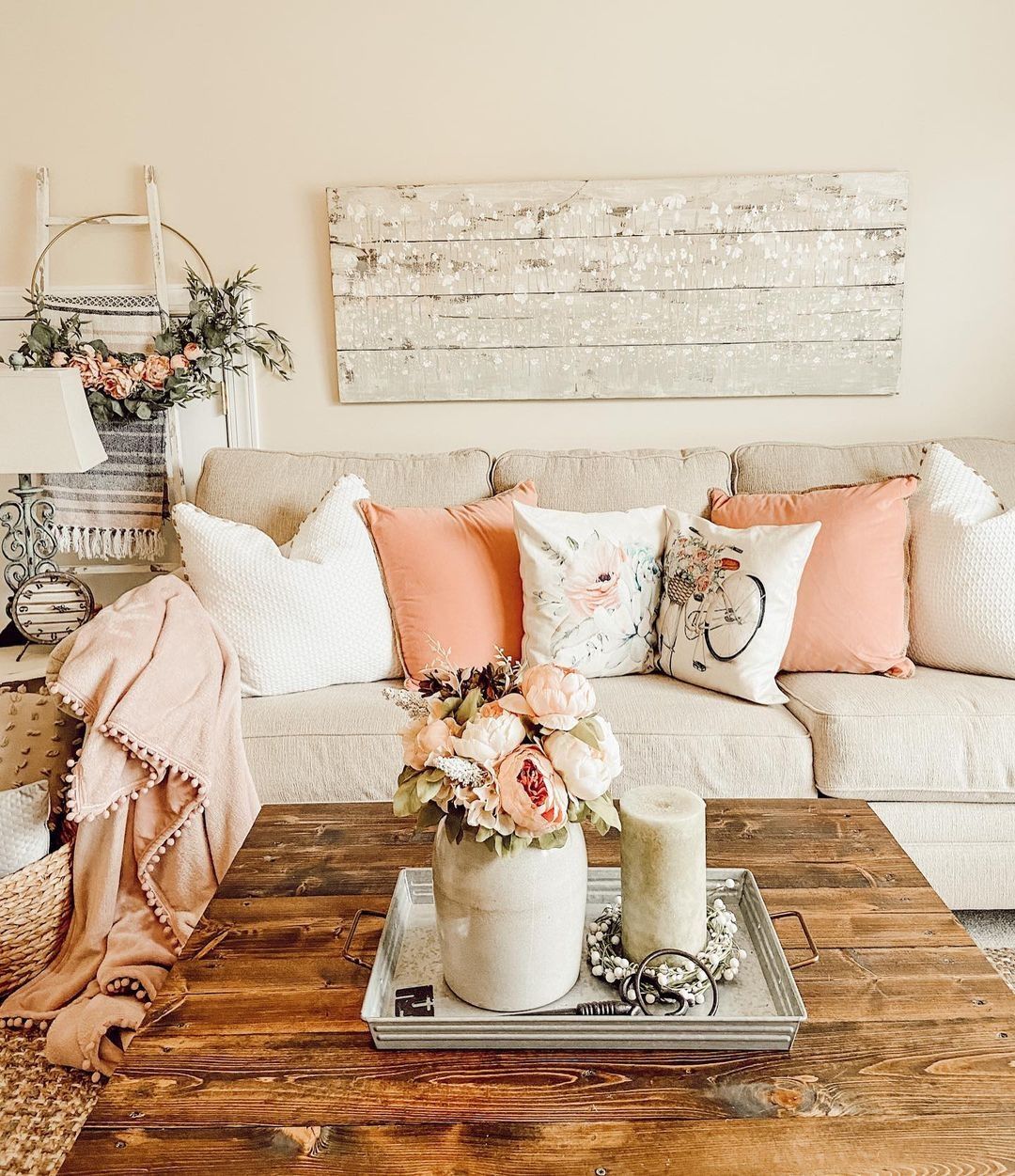 modern farmhouse living room with peach pillows