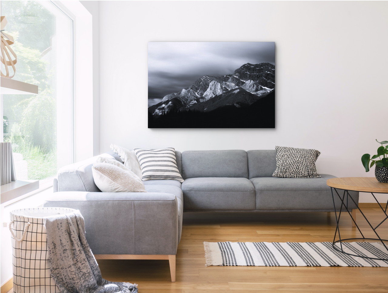 living room with black and white nature art print